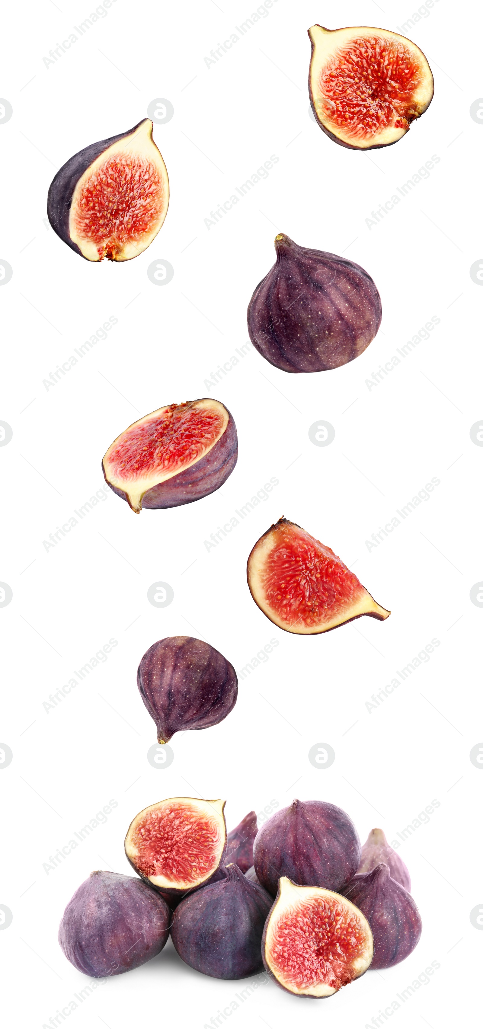 Image of Cut and whole figs falling on white background