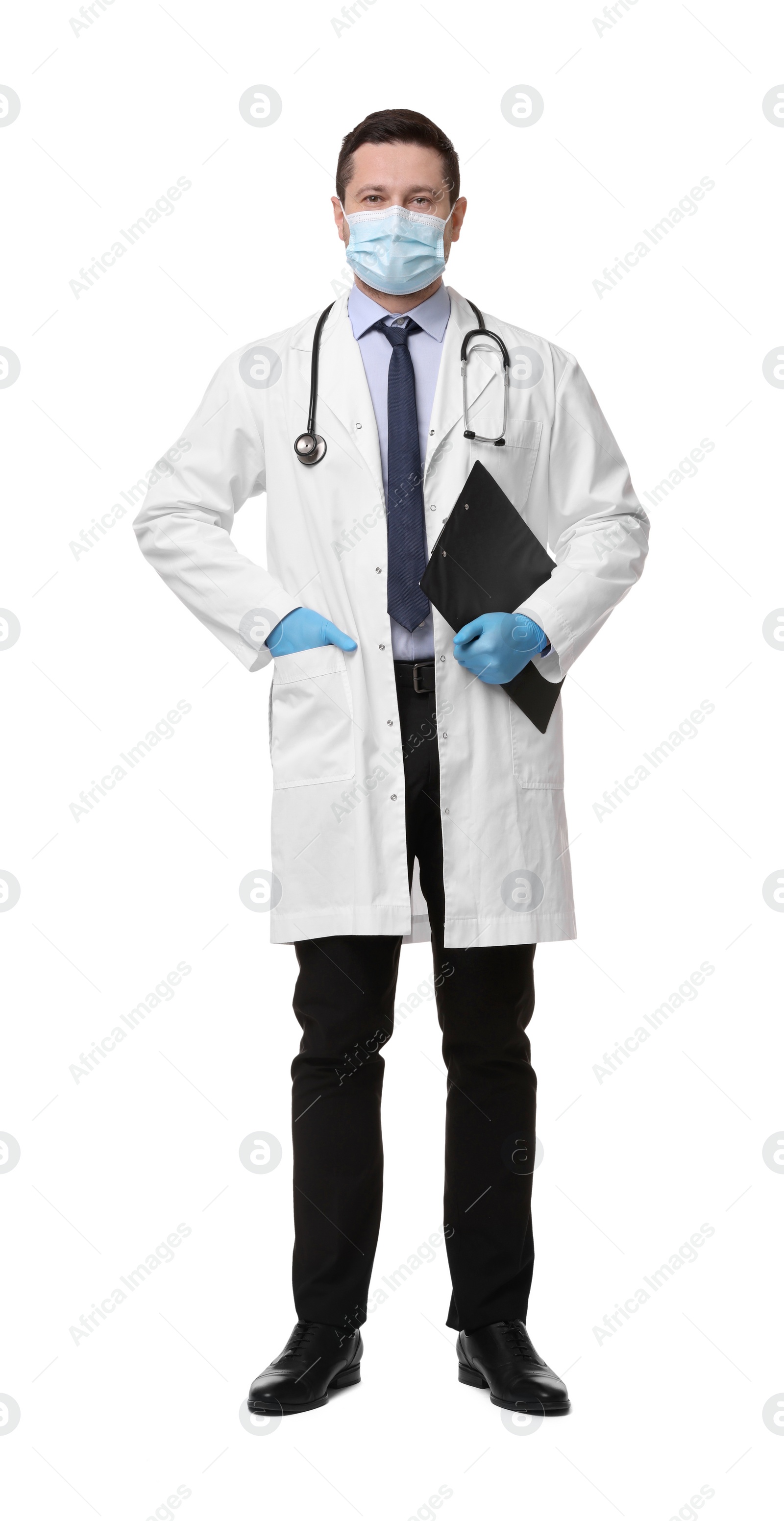 Photo of Doctor in medical mask with clipboard isolated on white