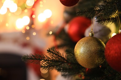 Closeup view of beautifully decorated Christmas tree indoors