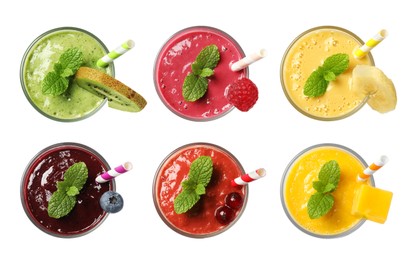 Set with different tasty smoothies on white background, top view