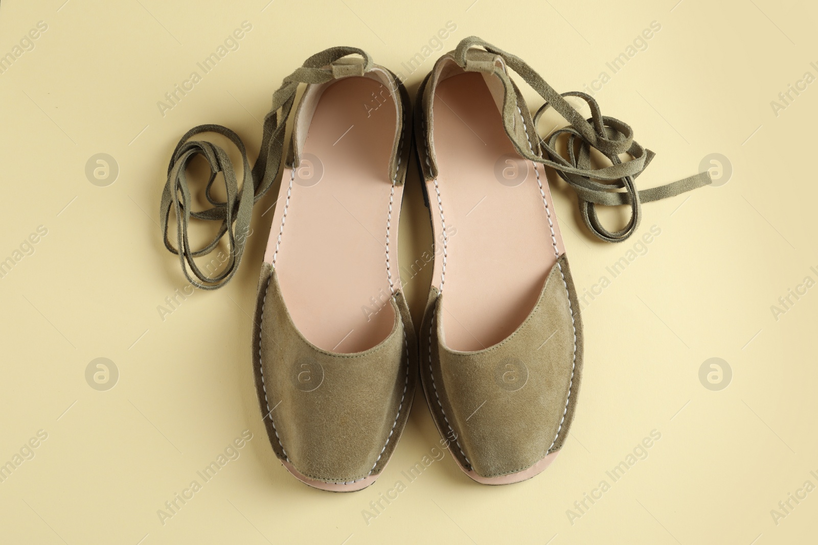 Photo of Pair of trendy women's shoes on color background