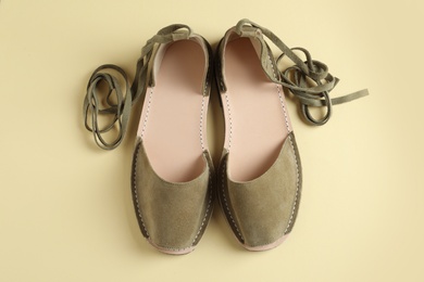 Photo of Pair of trendy women's shoes on color background