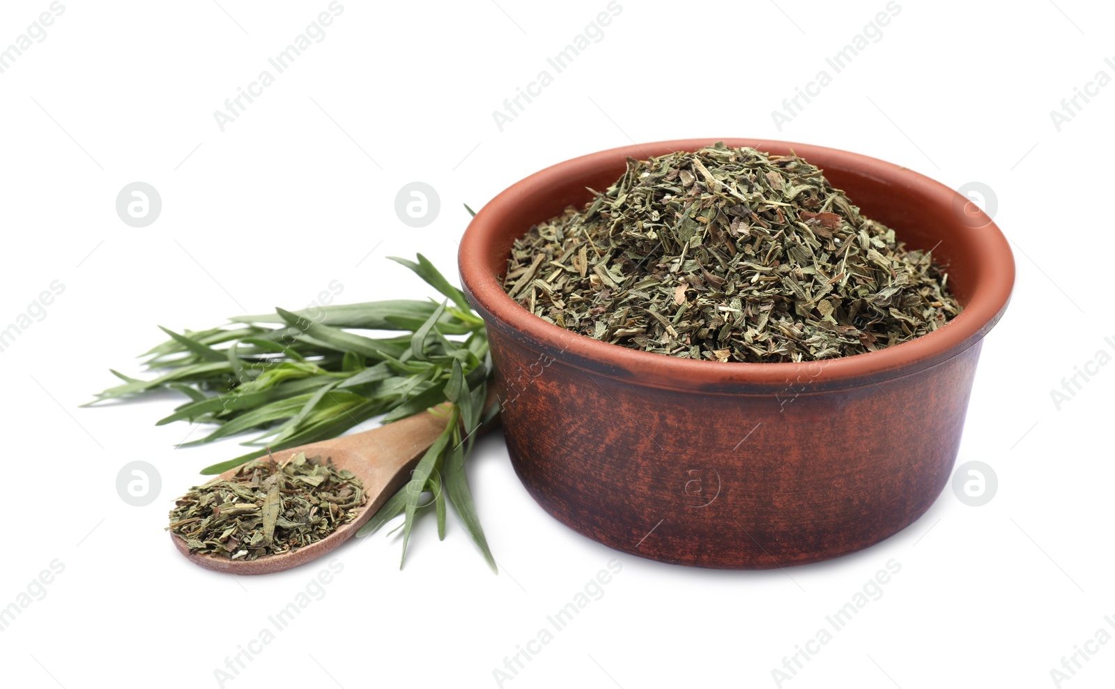 Photo of Bowl of dry tarragon, spoon and fresh leaves isolated on white