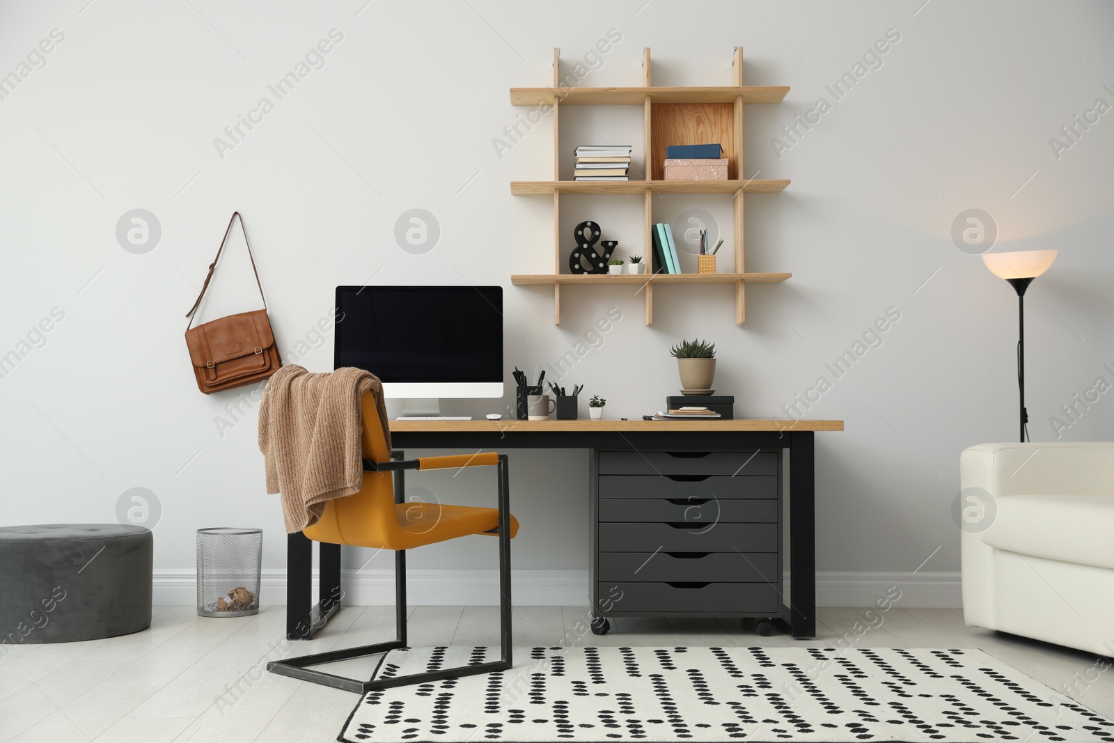 Photo of Stylish room interior with modern comfortable workplace