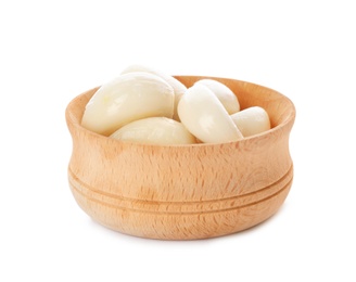 Photo of Bowl with preserved garlic on white background