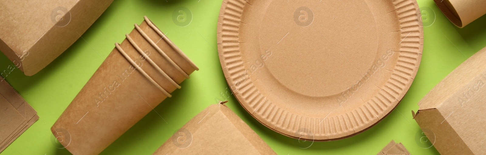 Image of Flat lay composition with eco friendly products on light green background. Banner design