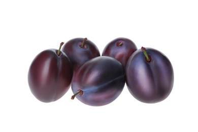 Photo of Delicious fresh ripe plums isolated on white