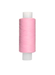 Spool of pink sewing thread isolated on white