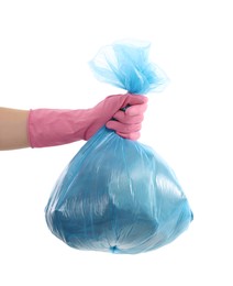 Photo of Woman holding plastic bag full of garbage on white background, closeup