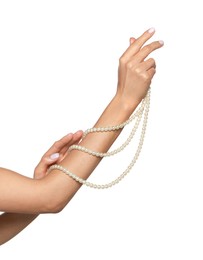 Photo of Young woman with elegant pearl necklace on white background, closeup