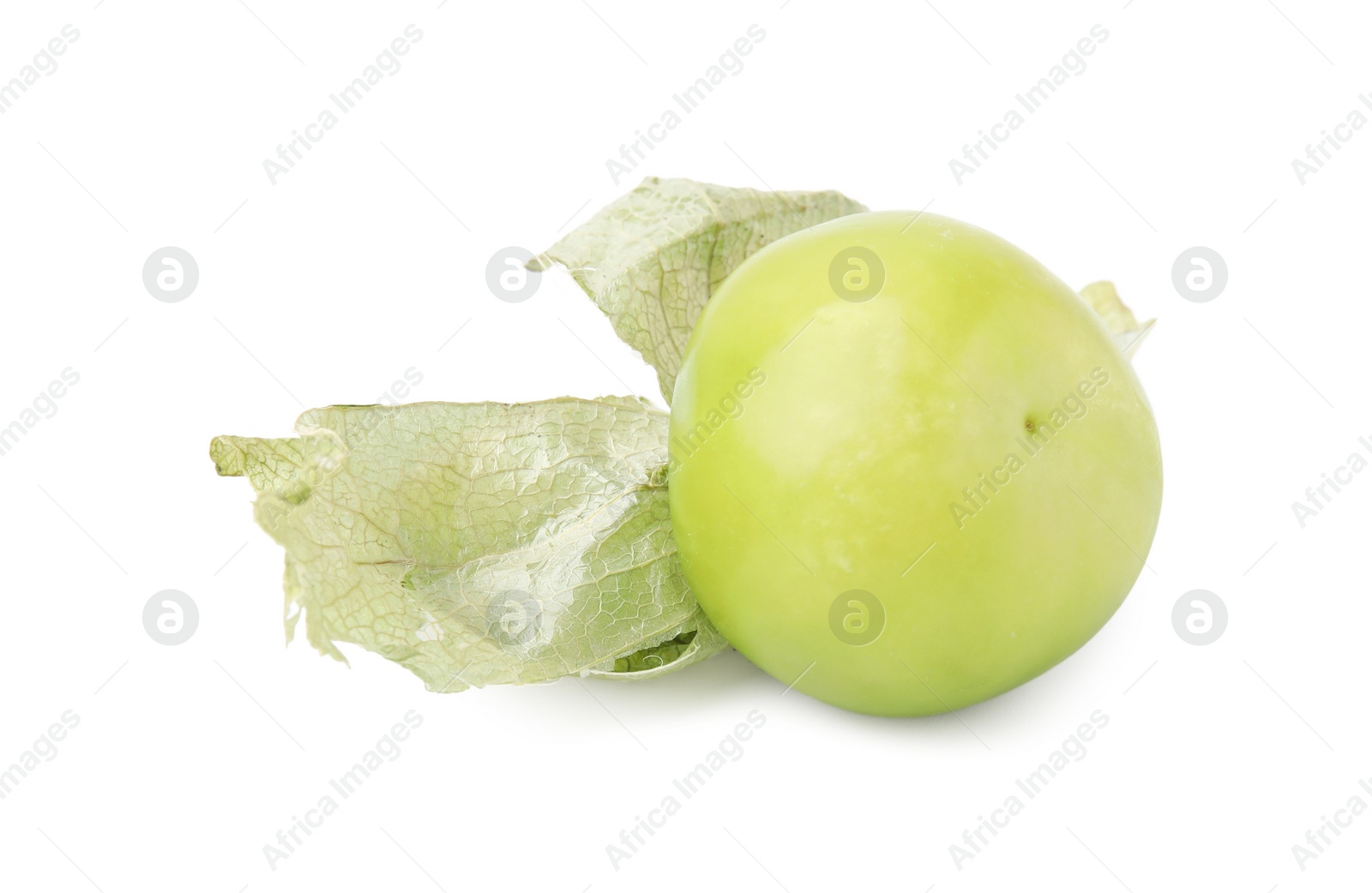 Photo of Fresh green tomatillo with husk isolated on white