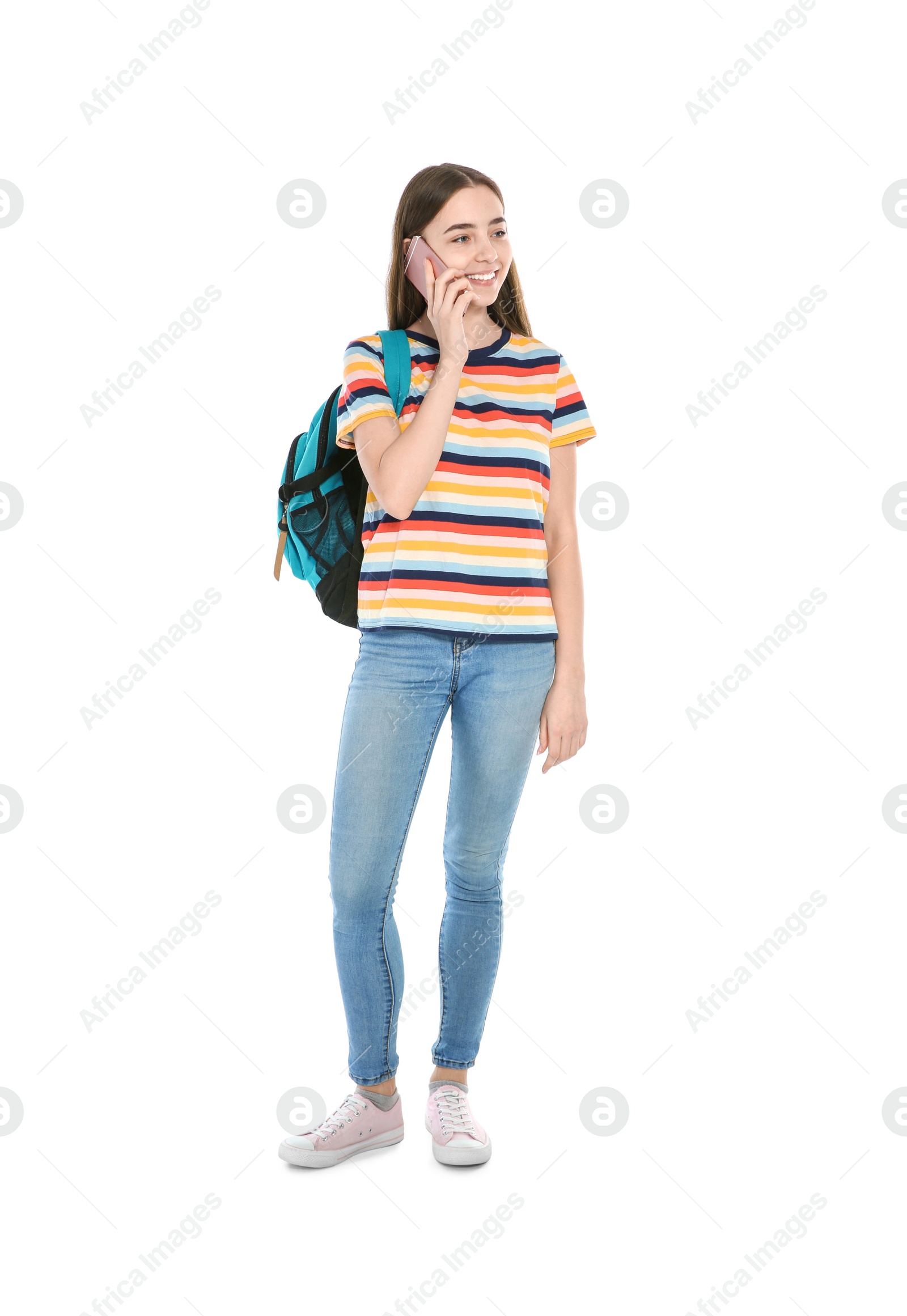 Photo of Beautiful teenager girl with mobile phone on white background