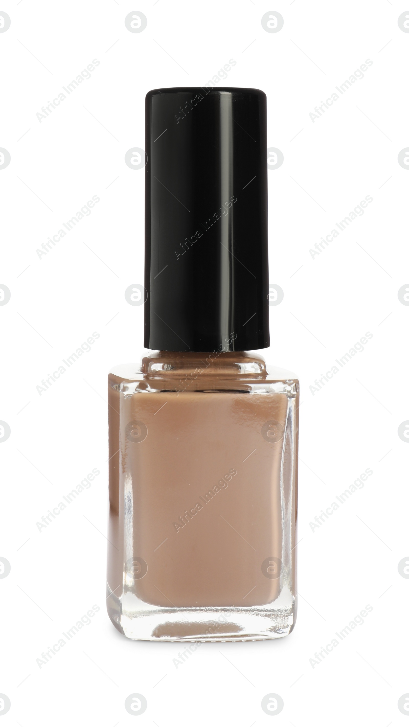 Photo of Beige nail polish in bottle isolated on white