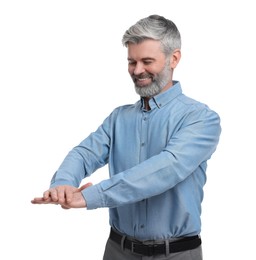 Mature businessman in stylish clothes posing on white background