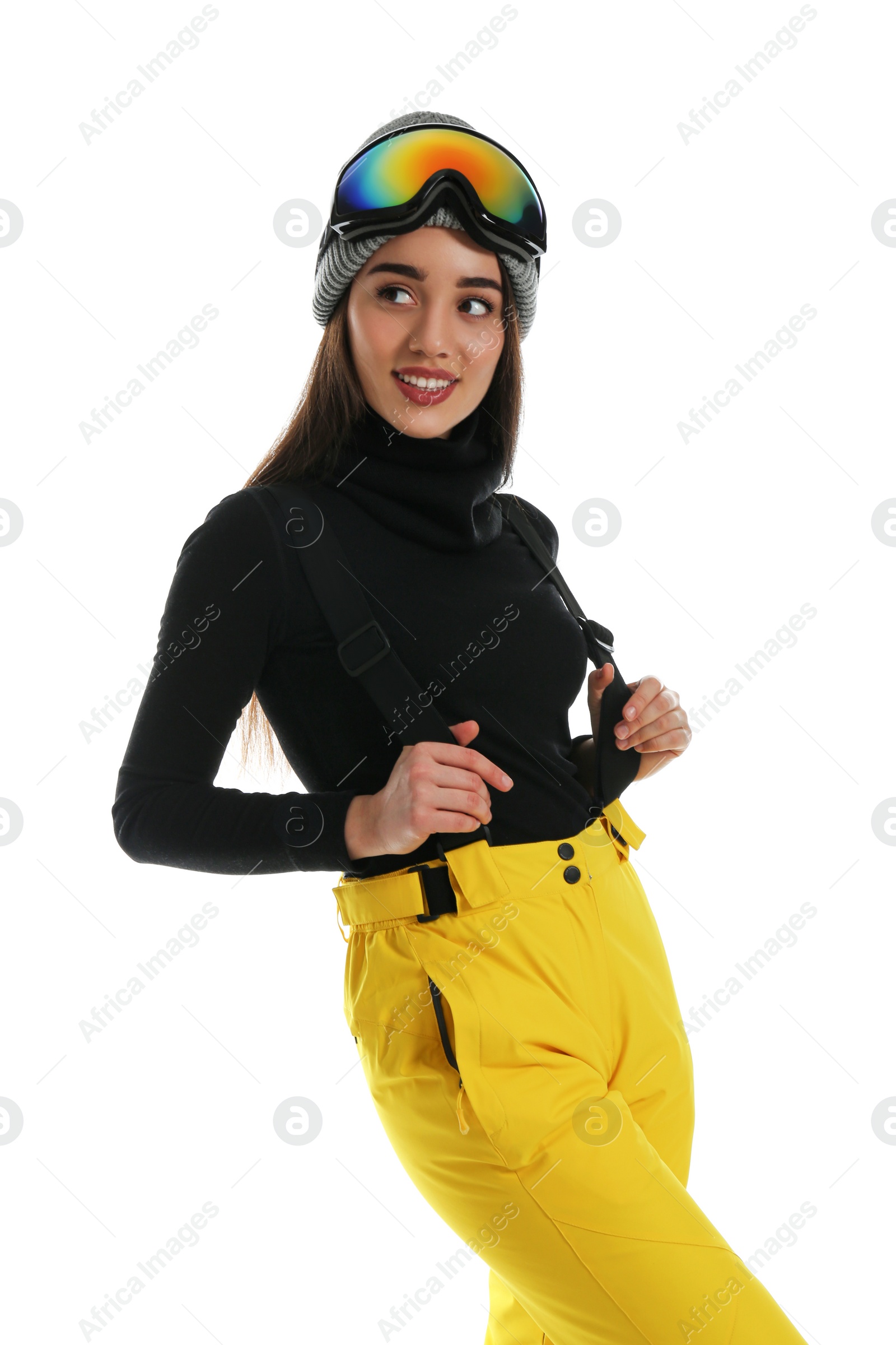 Photo of Woman wearing stylish winter sport clothes on white background