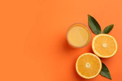 Delicious orange juice and fresh fruit on color background, flat lay. Space for text