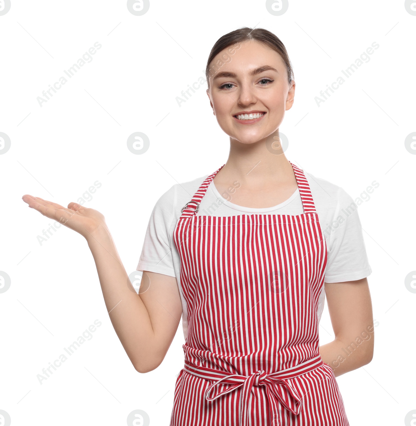 Photo of Beautiful young woman in clean striped apron on white background