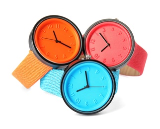 Stylish colorful wrist watches on white background. Fashion accessory