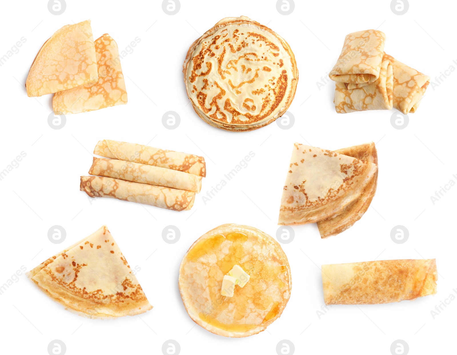 Image of Set of tasty thin pancakes on white background, top view