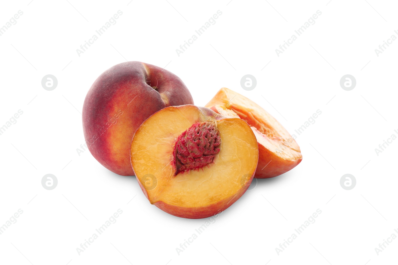 Photo of Whole and cut ripe peaches isolated on white