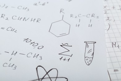 Photo of Sheets of paper with different chemical formulas, closeup
