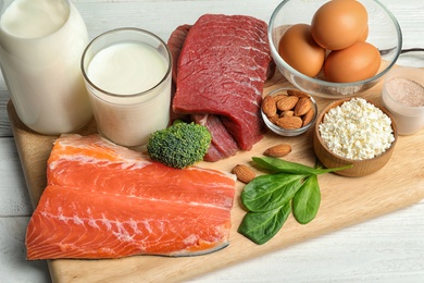 Photo of Different natural food on table. High protein diet