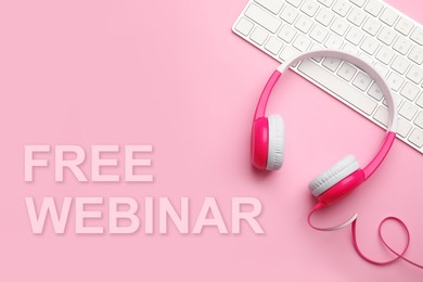 Image of FREE WEBINAR. Modern headphones and keyboard on pink background, flat lay