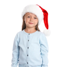 Photo of Happy little child in Santa hat on white background. Christmas celebration