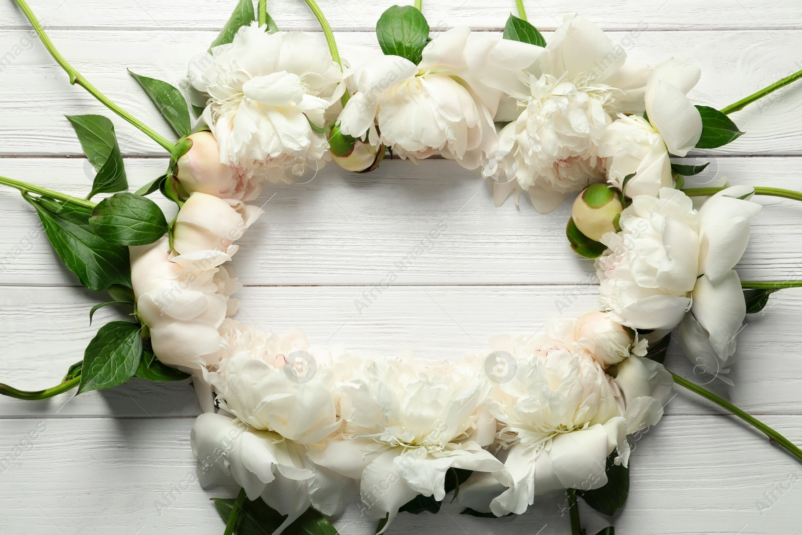 Photo of Flat lay composition with beautiful blooming peonies on wooden background