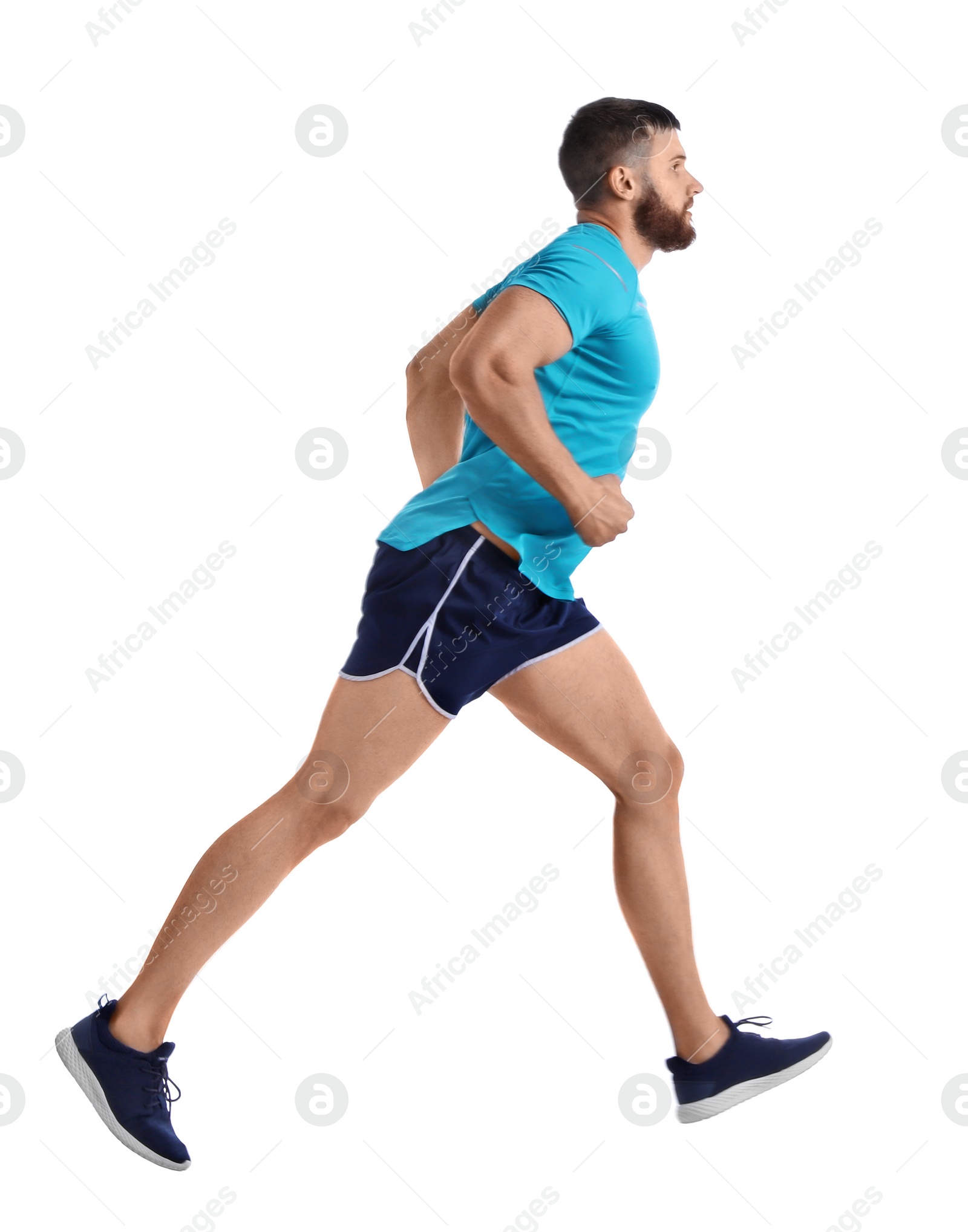 Photo of Young man in sportswear running on white background