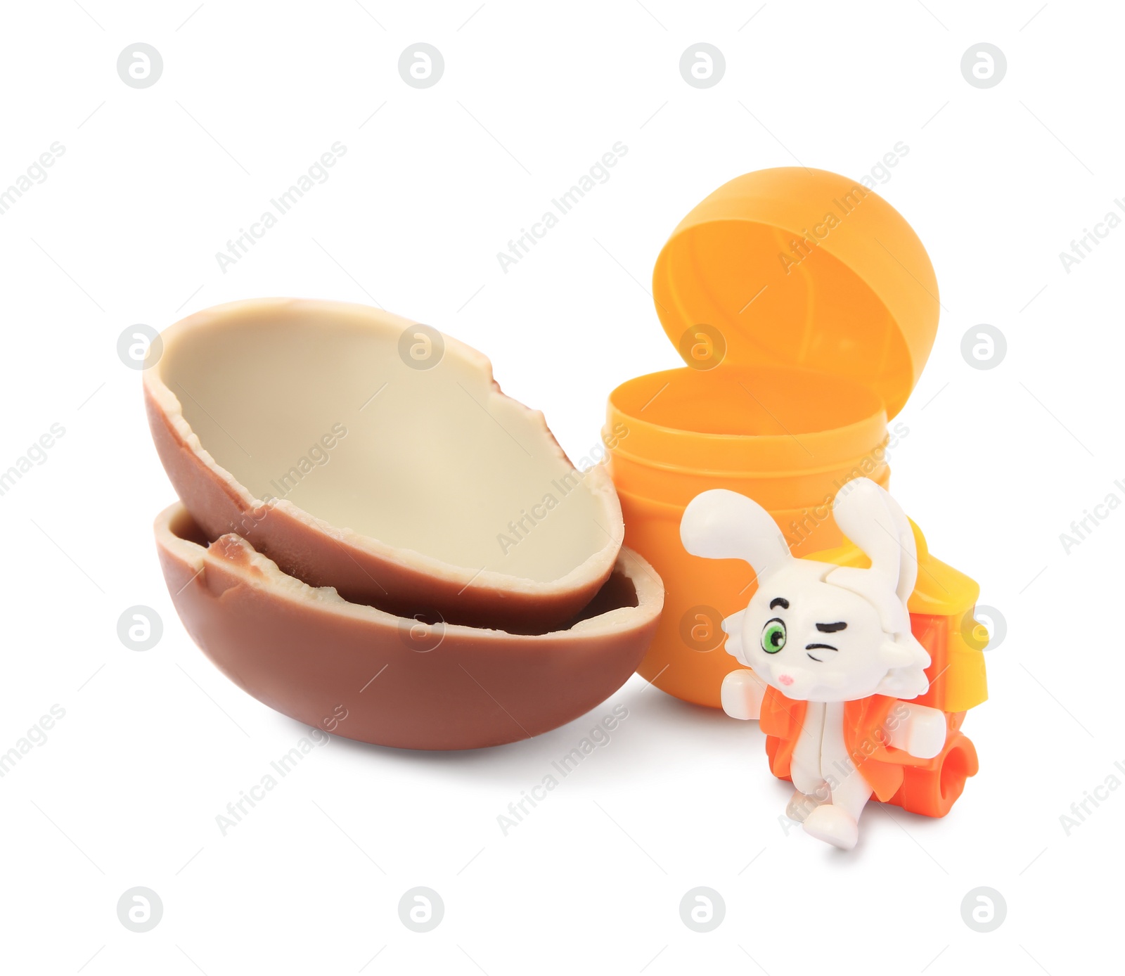 Photo of Slynchev Bryag, Bulgaria - May 24, 2023: Halves of Kinder Surprise Egg, plastic capsule and toy isolated on white