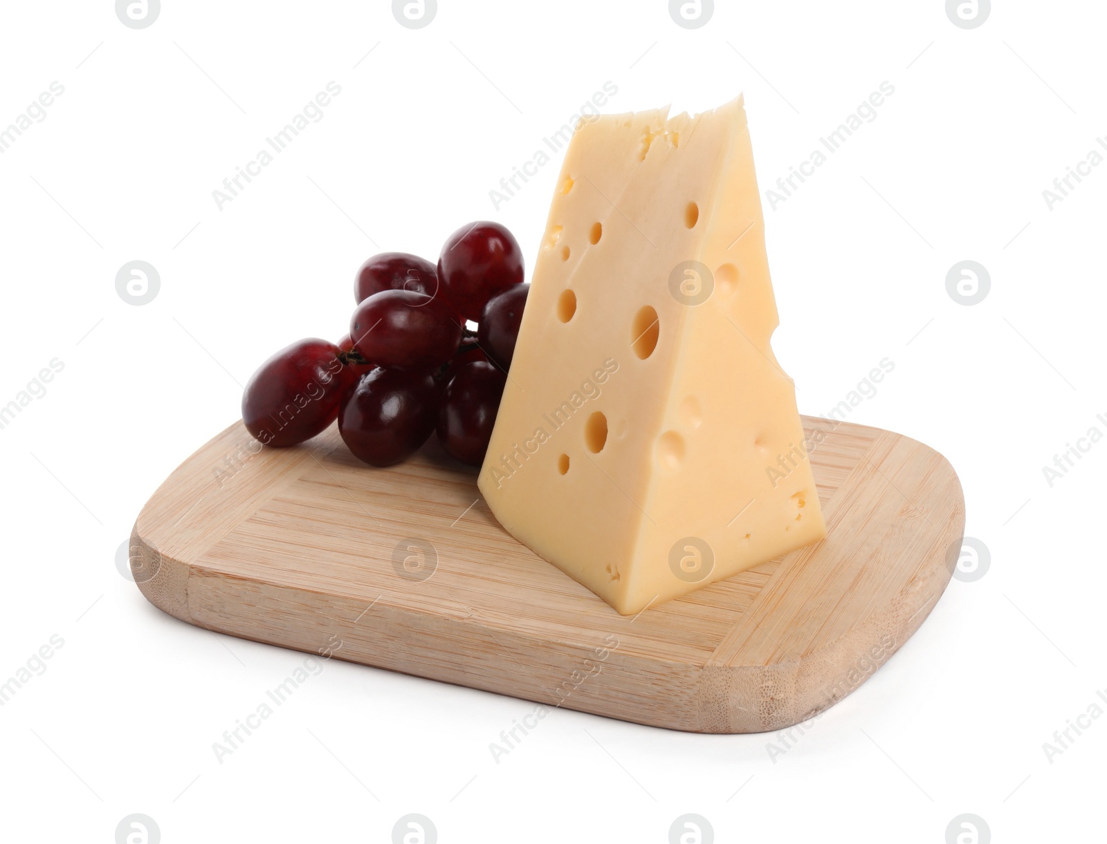 Photo of Piece of delicious cheese and grapes isolated on white