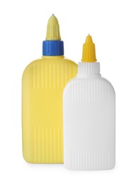 Photo of Blank bottles of glue on white background