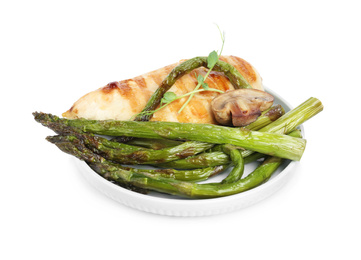 Photo of Tasty grilled chicken fillet with asparagus and mushroom isolated on white