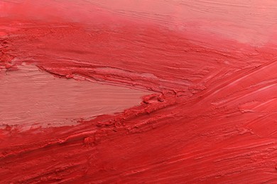 Photo of Texture of different lipsticks as background, closeup