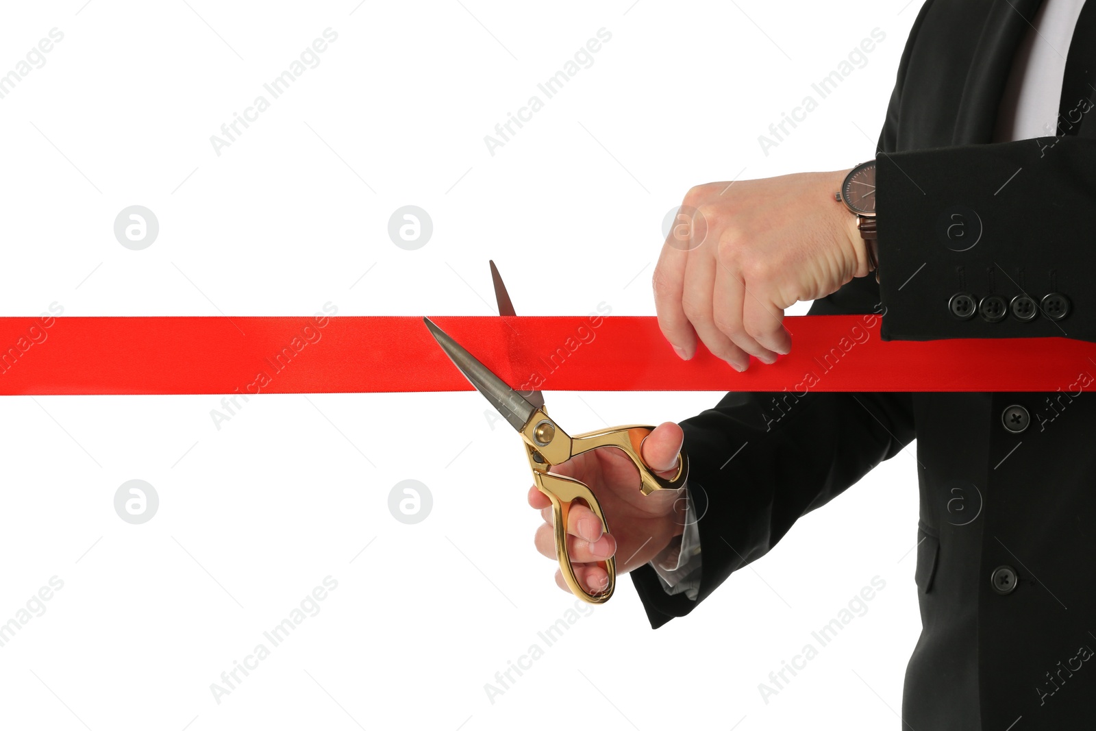 Photo of Man in office suit cutting red ribbon isolated on white, closeup