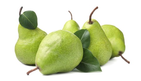 Heap of fresh ripe pears with green leaves on white background