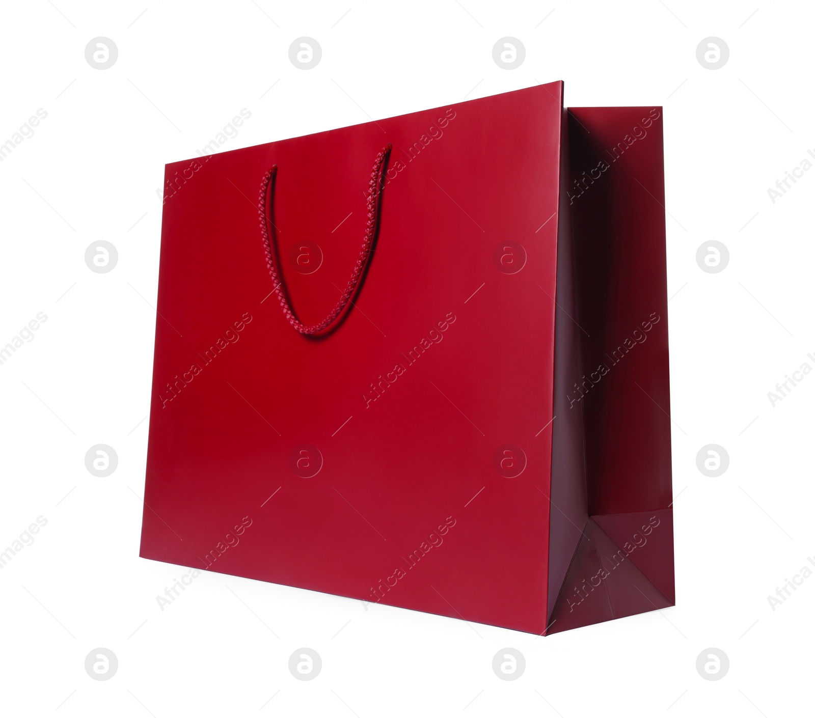 Photo of Red gift paper bag on white background