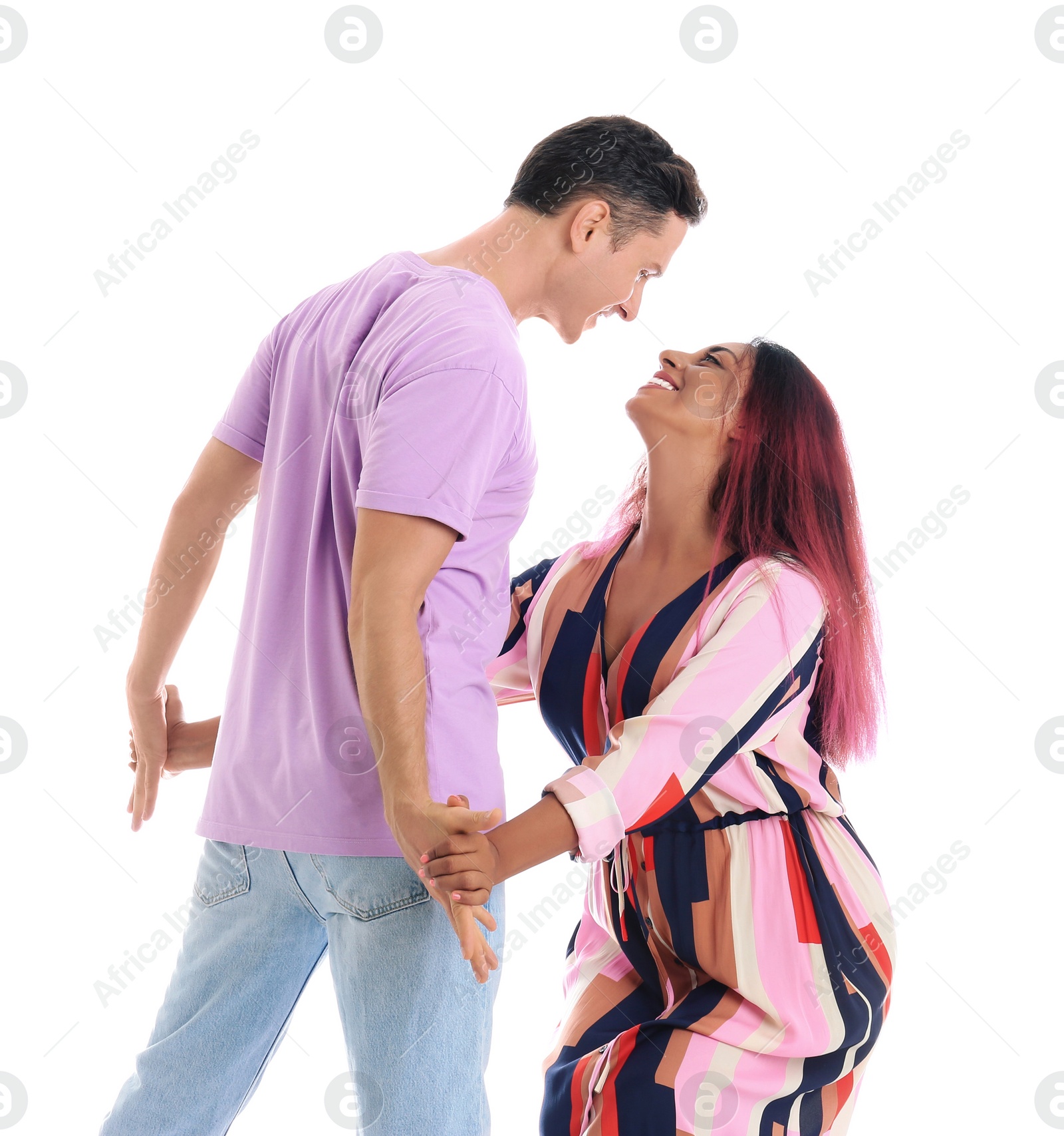 Photo of Beautiful lovely couple dancing on white background