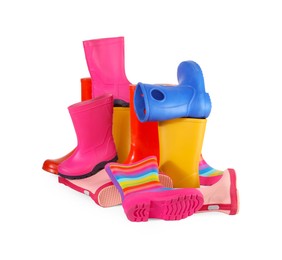 Photo of Pile of different female gumboots isolated on white