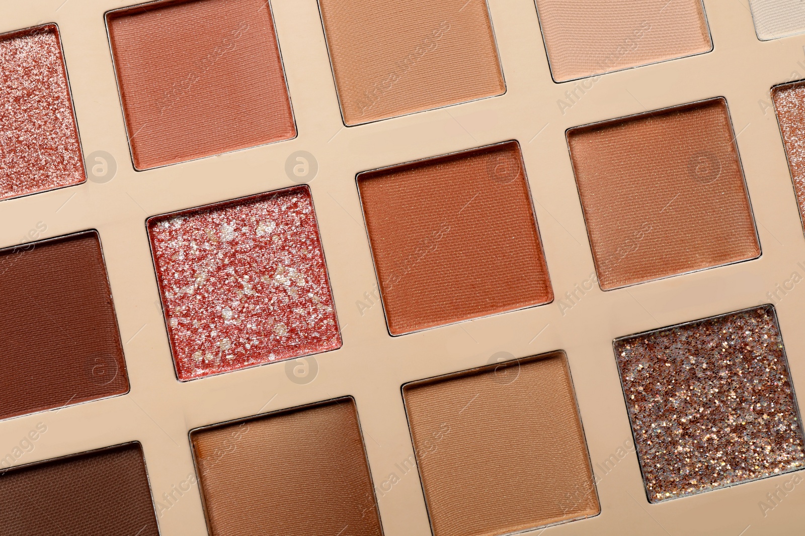 Photo of Beautiful eye shadow palette as background, top view