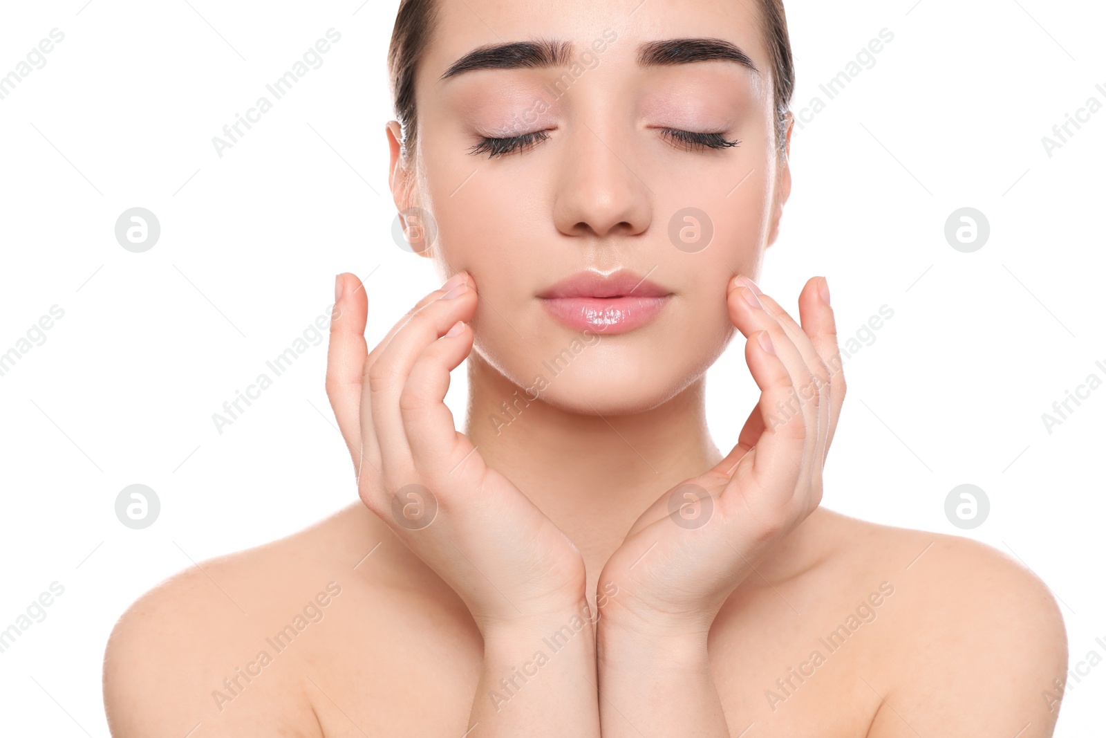 Photo of Portrait of young woman with beautiful face against white background