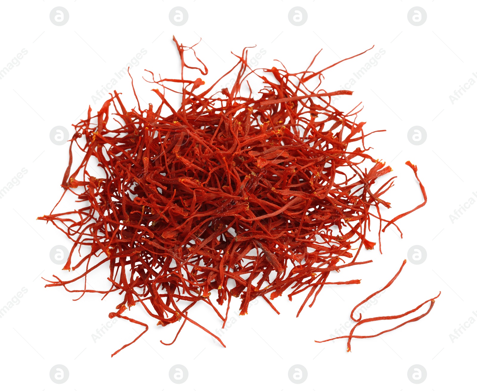 Photo of Pile of dried red saffron isolated on white, top view