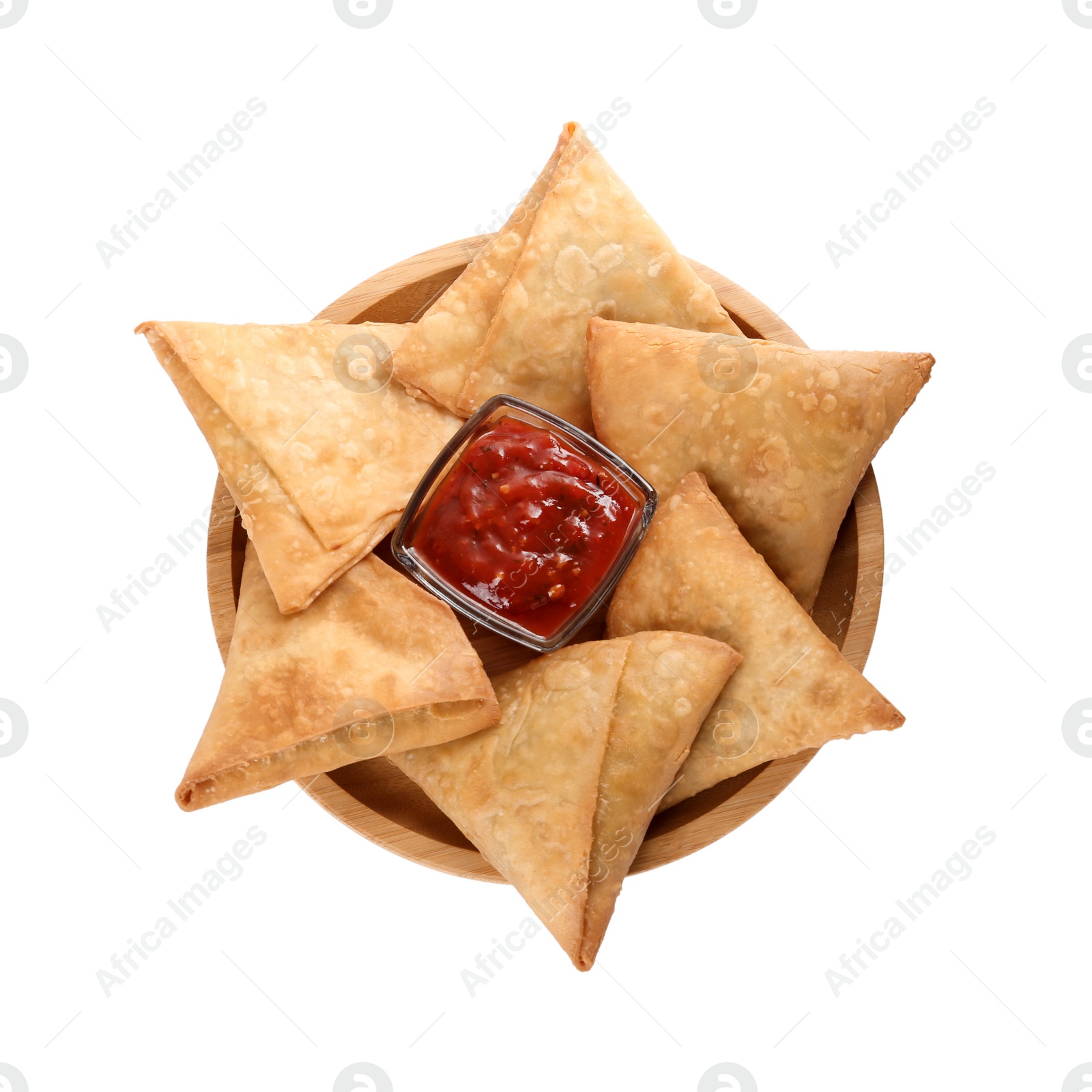 Photo of Fresh delicious crispy samosas with sauce on white background, top view