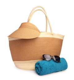 Photo of Stylish straw bag with beach objects isolated on white