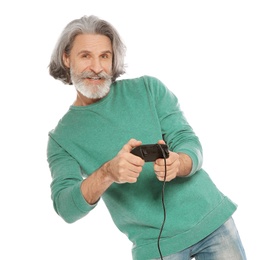 Photo of Emotional mature man playing video games with controller isolated on white