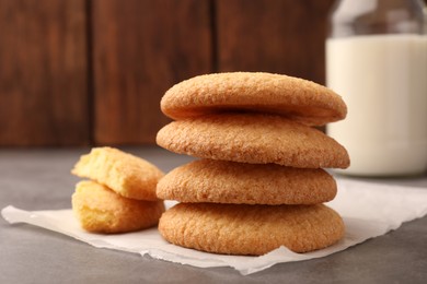 Delicious Danish butter cookies on grey table, closeup