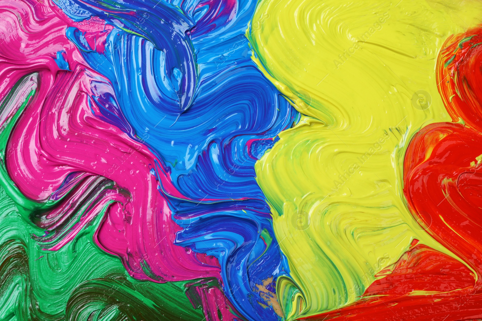 Photo of Abstract colorful acrylic paint as background, top view