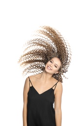 Portrait of beautiful young woman with shiny wavy hair on white background