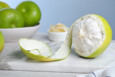 Photo of Fresh ripe sweetie on table, closeup view